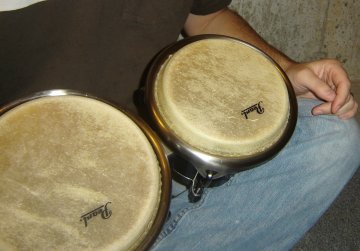 positioning the bongo drums