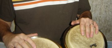 playing bongo drums