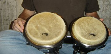 playing bongo drums angled